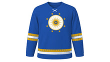 Load image into Gallery viewer, All Saints' Day Original Hockey Jersey in Royal Blue, front view – a radiant gold sunburst medallion ringed by eight-point stars on the chest and star-studded sleeve and hem stripes – custom name and number