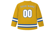 Load image into Gallery viewer, All Saints' Day Original Hockey Jersey in Radiant Gold, back view with star-studded sleeve and hem stripes and your name and number