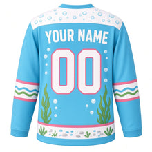 Load image into Gallery viewer, Axolotl Lagoon Original Hockey Jersey in Lagoon Aqua, back view with your name and number – bubble-pattern yoke and wavy water-plant sleeve stripes