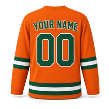 Load image into Gallery viewer, Baisakhi Original Hockey Jersey in Orange, back view with your name and number