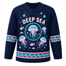 Load image into Gallery viewer, Bioluminescent Deep Sea Original Hockey Jersey in Abyss Navy, front view – glowing jellyfish and deep-sea light specks with jellyfish bubble-ring crest, custom name and number