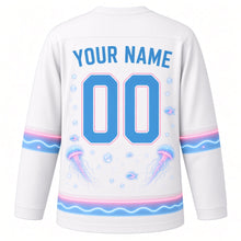 Load image into Gallery viewer, Bioluminescent Deep Sea Original Hockey Jersey in Pearl Glow, back view with your name and number – bubble-dot yoke and glowing wave hem stripes