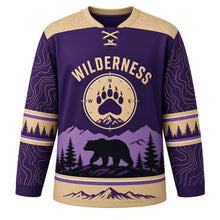 Load image into Gallery viewer, Black Bear Wilderness Original Hockey Jersey in Huckleberry Dusk, front view – black bear on a rocky ridge with pines and paw-print crest, custom name and number