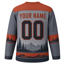Load image into Gallery viewer, Black Bear Wilderness Original Hockey Jersey in Slate Ridge, back view with your name and number – contour-line yoke and mountain-ridge hem stripes