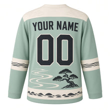 Load image into Gallery viewer, Bonsai Zen Garden Original Hockey Jersey in Misty Jade, back view with your name and number – ripple-pattern yoke and raked-sand sleeve stripes