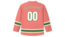 Load image into Gallery viewer, Cairns Original Hockey Jersey in Coral Pink, back view with your name and number