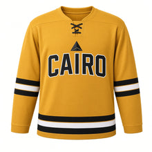 Load image into Gallery viewer, Cairo Original Hockey Jersey in Gold, front view – custom name and number