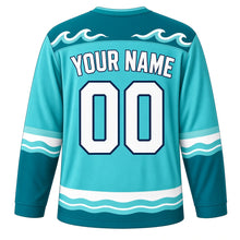 Load image into Gallery viewer, Calm Waves Emotion Hockey Jersey in Lagoon Aqua, back view with your name and number – rolling wave yoke and teal wave sleeve stripes