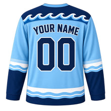 Load image into Gallery viewer, Calm Waves Emotion Hockey Jersey in Ocean Blue, back view with your name and number – rolling wave yoke and blue wave sleeve stripes