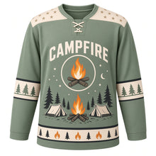 Load image into Gallery viewer, Campfire Starry Night Original Hockey Jersey in Smoky Sage, front view – crackling campfire with tents and pines under the stars with campfire crest, custom name and number