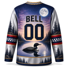 Load image into Gallery viewer, Canada Loon Lake Twilight Original Hockey Jersey in Moonlit Silver, back view with your name and number – loon gliding on a moonlit lake below the number