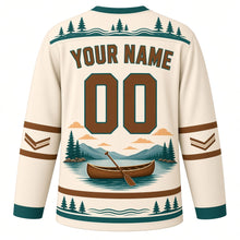 Load image into Gallery viewer, Canoe Mountain Lake Original Hockey Jersey in Campfire Cream, back view with your name and number – pine tree yoke and paddle-chevron sleeve bands