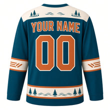 Load image into Gallery viewer, Canoe Mountain Lake Original Hockey Jersey in Lake Teal, back view with your name and number – pine tree yoke and paddle-chevron sleeve bands