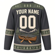 Load image into Gallery viewer, Canoe Mountain Lake Original Hockey Jersey in Pine Charcoal, back view with your name and number – pine tree yoke and paddle-chevron sleeve bands