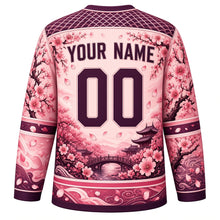 Load image into Gallery viewer, Cherry Blossom Garden Original Hockey Jersey in Sakura Pink, back view with your name and number – petal lattice yoke and blossom-branch sleeve stripes