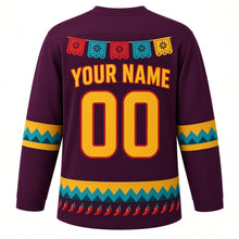 Load image into Gallery viewer, Chili Pepper Fiesta Original Hockey Jersey in Agave Plum, back view with your name and number – cut-paper banner yoke and serape-stripe sleeve bands