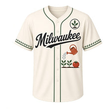Load image into Gallery viewer, Community Garden Milwaukee Baseball Jersey in Garden Cream, front view – watering can with seedlings and tomato graphic with seedling crest, custom name and number