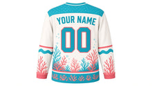Load image into Gallery viewer, Coral Reef Wonders Original Hockey Jersey in Sand White, back view with your name and number – bubble-dot yoke and wave sleeve stripes