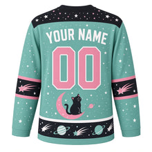 Load image into Gallery viewer, Cosmic Cat Galaxy Original Hockey Jersey in Cosmic Mint, back view with your name and number – star-dot yoke and comet-tail sleeve bands