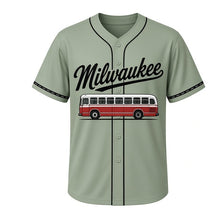 Load image into Gallery viewer, Crosstown Bus Milwaukee Baseball Jersey in Depot Sage, front view – rounded vintage city bus on a road line graphic with steering-wheel crest, custom name and number