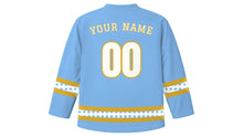 Load image into Gallery viewer, Day of the Holy Innocents Original Hockey Jersey in Sky Blue, back view with your name and number