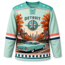Load image into Gallery viewer, Detroit Tailfin Cruiser Boulevard Original Hockey Jersey in Cruiser Mint, front view – mint tailfin car on an oak-lined avenue with factory smokestacks, custom name and number