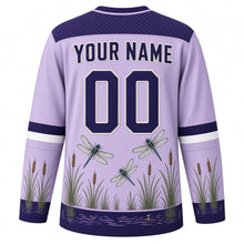 Load image into Gallery viewer, Dragonfly Marsh Original Hockey Jersey in Iris Lilac, back view with your name and number – wing-lattice yoke and reed-stripe sleeve bands