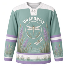Load image into Gallery viewer, Dragonfly Marsh Original Hockey Jersey in Marsh Teal, front view – dragonflies over marsh reeds and cattails with dragonfly crest, custom name and number