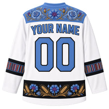 Load image into Gallery viewer, Estonia Original Hockey Jersey in Limestone White, back view with your name and number – ornate Muhu floral embroidery yoke, Kihnu-stripe sleeve bands and rye-and-cornflower hem band, detailed artwork