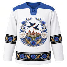 Load image into Gallery viewer, Estonia Original Hockey Jersey in Limestone White, front view – ornate Muhu-embroidered cornflower wreath crest with barn swallows over Tallinn's limestone towers, floral embroidery yoke, detailed artwork, custom name and number