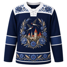 Load image into Gallery viewer, Estonia Original Hockey Jersey in Baltic Sea Navy, front view – ornate Muhu-embroidered cornflower wreath crest with barn swallows over Tallinn's limestone towers, floral embroidery yoke, detailed artwork, custom name and number