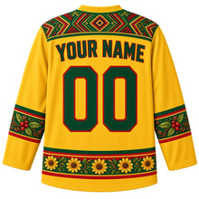 Load image into Gallery viewer, Ethiopia Original Hockey Jersey in Adey Abeba Yellow, back view with your name and number – ornate tibeb-weave yoke, coffee-cherry sleeve bands and adey abeba daisy hem band, detailed artwork