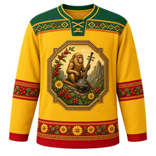 Load image into Gallery viewer, Ethiopia Original Hockey Jersey in Adey Abeba Yellow, front view – ornate tibeb-framed crest with a Simien gelada, jebena coffee pot, coffee cherries and adey abeba daisies, tibeb-weave yoke, detailed artwork, custom name and number