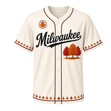 Load image into Gallery viewer, Fall Foliage Bluffs Milwaukee Baseball Jersey in Harvest Cream, front view – three autumn trees on a lakeshore bluff graphic with autumn-leaf crest, custom name and number
