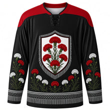 Load image into Gallery viewer, Fiesta de San Isidro Original Hockey Jersey in Chulapo Black, front view with themed artwork and clean crest
