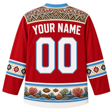 Load image into Gallery viewer, Fiji Original Hockey Jersey in Tagimoucia Red, back view with your name and number – masi-pattern yoke and coral reef hem band, detailed artwork