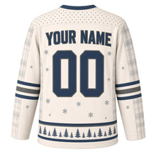 Load image into Gallery viewer, Frozen Pond Retro Original Hockey Jersey in Snow Cream, back view with your name and number – snowflake-dot yoke and pine silhouette hem stripes