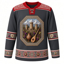Load image into Gallery viewer, Georgia Original Hockey Jersey in Caucasus Charcoal, front view – ornate knotwork-and-grapevine yoke and a crest of Svaneti stone tower houses with qvevri and panduri, detailed artwork, custom name and number