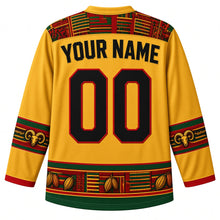 Load image into Gallery viewer, Ghana Original Hockey Jersey in Kente Gold, back view with your name and number – kente-weave yoke and Adinkra-symbol sleeve bands, detailed artwork