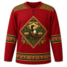 Load image into Gallery viewer, Ghana Original Hockey Jersey in Adinkra Red, front view – ornate kente-weave yoke and Sankofa crest with talking drums and cocoa pods, detailed artwork, custom name and number