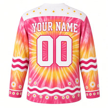 Load image into Gallery viewer, Groovy Tie-Dye Swirl Original Hockey Jersey in Sunset Spiral, back view with your name and number – daisy-pattern yoke and wavy-stripe sleeve bands