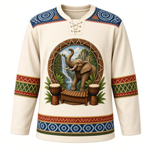 Load image into Gallery viewer, Guinea Original Hockey Jersey in Cotton Ivory, front view – ornate elephant before Fouta Djallon waterfalls with djembes and balafon, indigo léppi yoke, detailed illustrated artwork, custom name and number