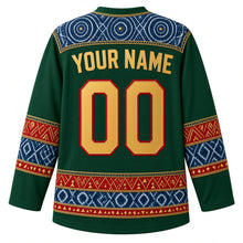 Load image into Gallery viewer, Guinea Original Hockey Jersey in Fouta Djallon Green, back view with your name and number – ornate indigo léppi resist-dye yoke with rope-lacing chevron and indigo-circle bands, finely detailed artwork