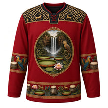 Load image into Gallery viewer, Guyana Original Hockey Jersey in Mashramani Red, front view – Kaieteur Falls and Victoria lily crest with hoatzin, ornate Amerindian basketry-weave yoke, detailed artwork, custom name and number
