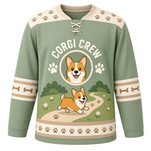 Load image into Gallery viewer, Happy Corgi Trails Original Hockey Jersey in Meadow Sage, front view – smiling corgi trotting on a path with paw prints and corgi crest, custom name and number