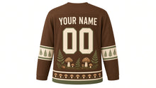 Load image into Gallery viewer, Hedgehog Mushroom Forest Original Hockey Jersey in Acorn Brown, back view with your name and number – acorn-dot yoke and fern-frond sleeve bands