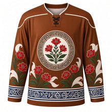 Load image into Gallery viewer, Heilala Festival Original Hockey Jersey in Ngatu Brown, front view with themed artwork and clean crest