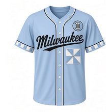 Load image into Gallery viewer, Heritage Quilt Milwaukee Baseball Jersey in Chambray Blue, front view – square patchwork quilt block graphic with thread-spool crest, custom name and number