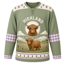 Load image into Gallery viewer, Highland Cow Meadow Original Hockey Jersey in Meadow Sage, front view – shaggy ginger highland cow in a thistle meadow with highland cow crest, custom name and number