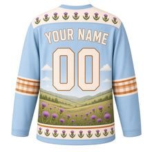 Load image into Gallery viewer, Highland Cow Meadow Original Hockey Jersey in Thistle Sky, back view with your name and number – thistle-pattern yoke and plaid-check sleeve bands